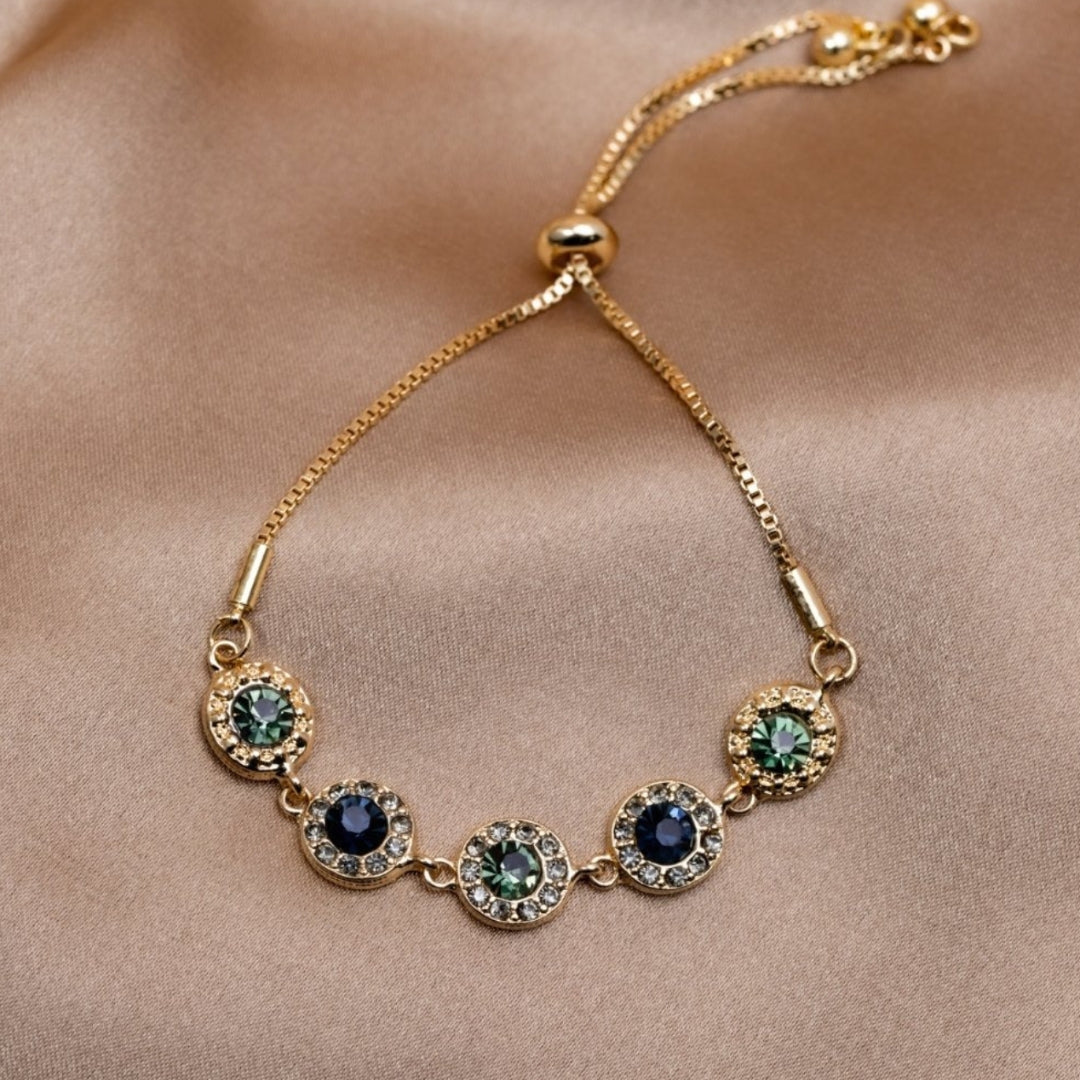 Brazalete de circonitas ajustable elegante en dorado brillante