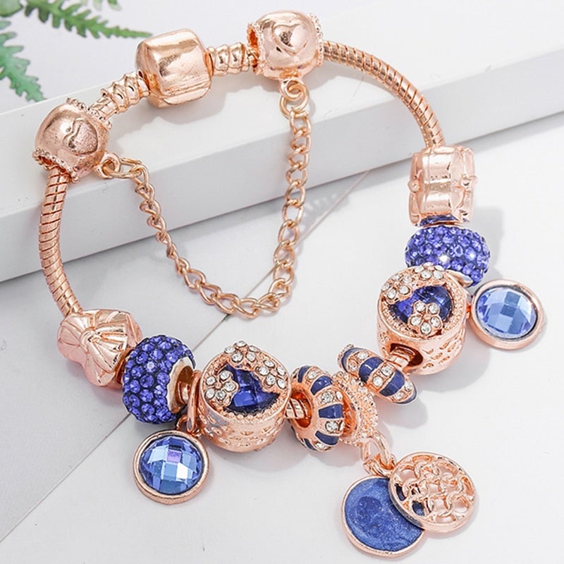 Reloj de pulsera elegante con plata rosa y cristal azul brillante