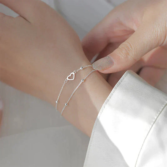Elegante pulsera ajustable en forma de corazón de plata de alta calidad