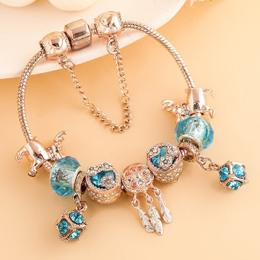 Elegante pulsera de plata rosa con brillantes zirconitas azules