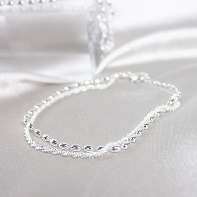 Pulsera de plata elegante con brillantes piedras de circonita