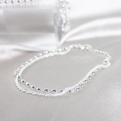 Pulsera de plata elegante con brillantes piedras de circonita