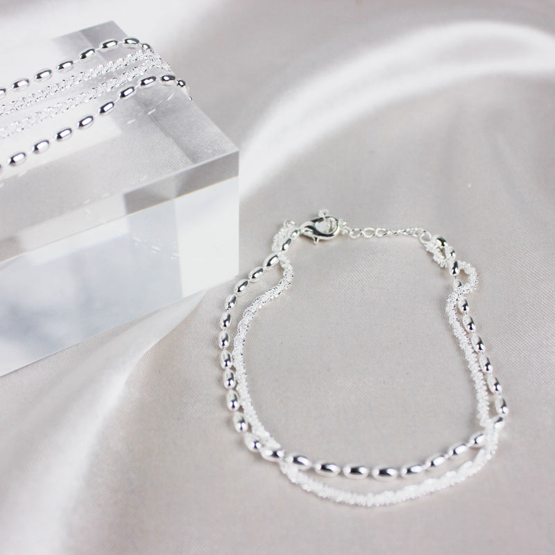 Pulsera de plata elegante con brillantes piedras de circonita