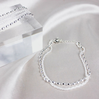 Pulsera de plata elegante con brillantes piedras de circonita