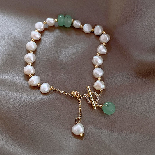 Pulsera aventurera con perlas de mar
