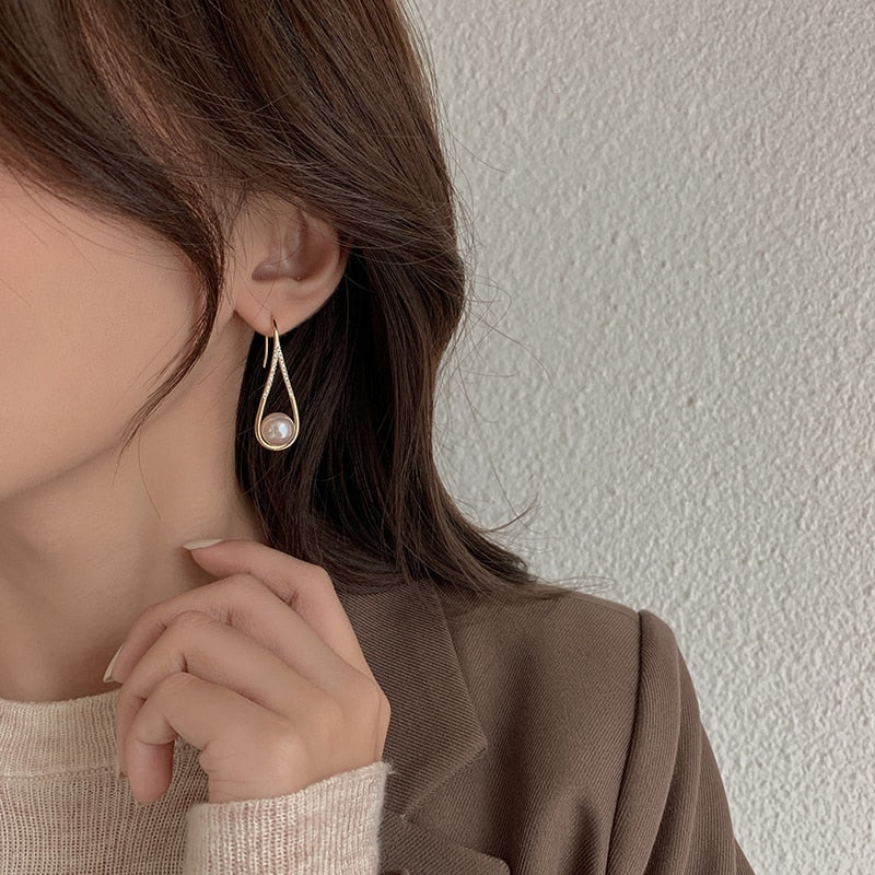 Pendientes de perlas en rosado elegante