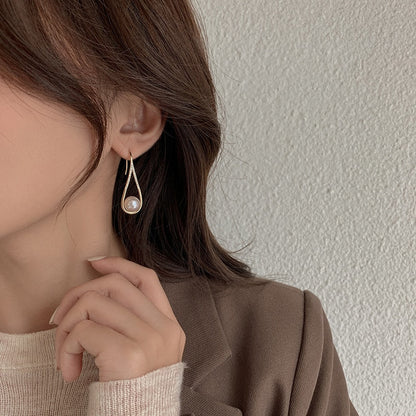 Pendientes de perlas en rosado elegante