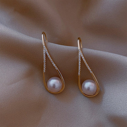 Pendientes de perlas en rosado elegante