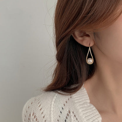 Pendientes de perlas en rosado elegante