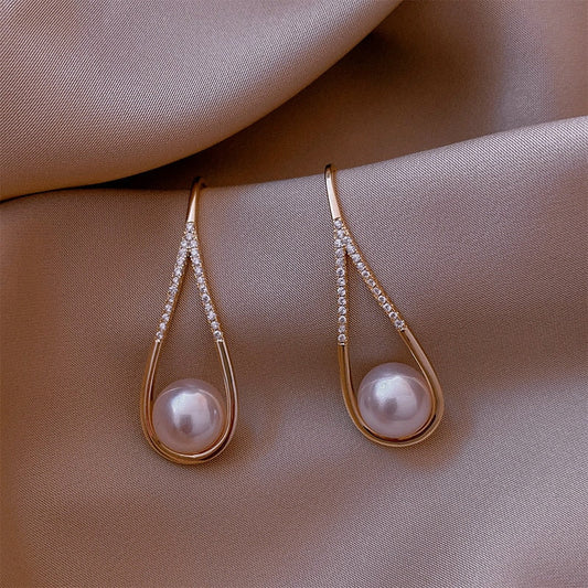 Pendientes de perlas en rosado elegante