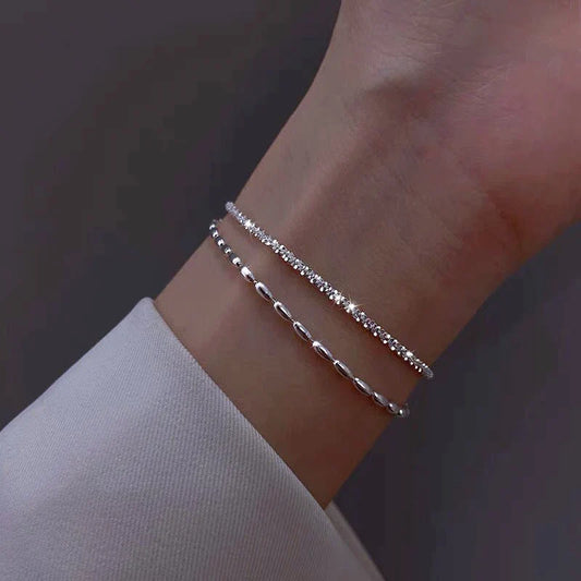 Pulsera de plata elegante con brillantes piedras de circonita