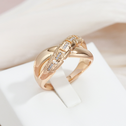 Anillo cruzado elegante con zirconitas brillantes