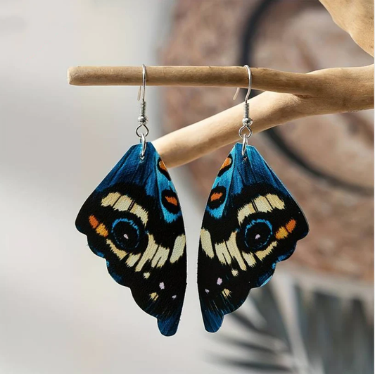 Pendientes vintage encantadores con alas de mariposa azules